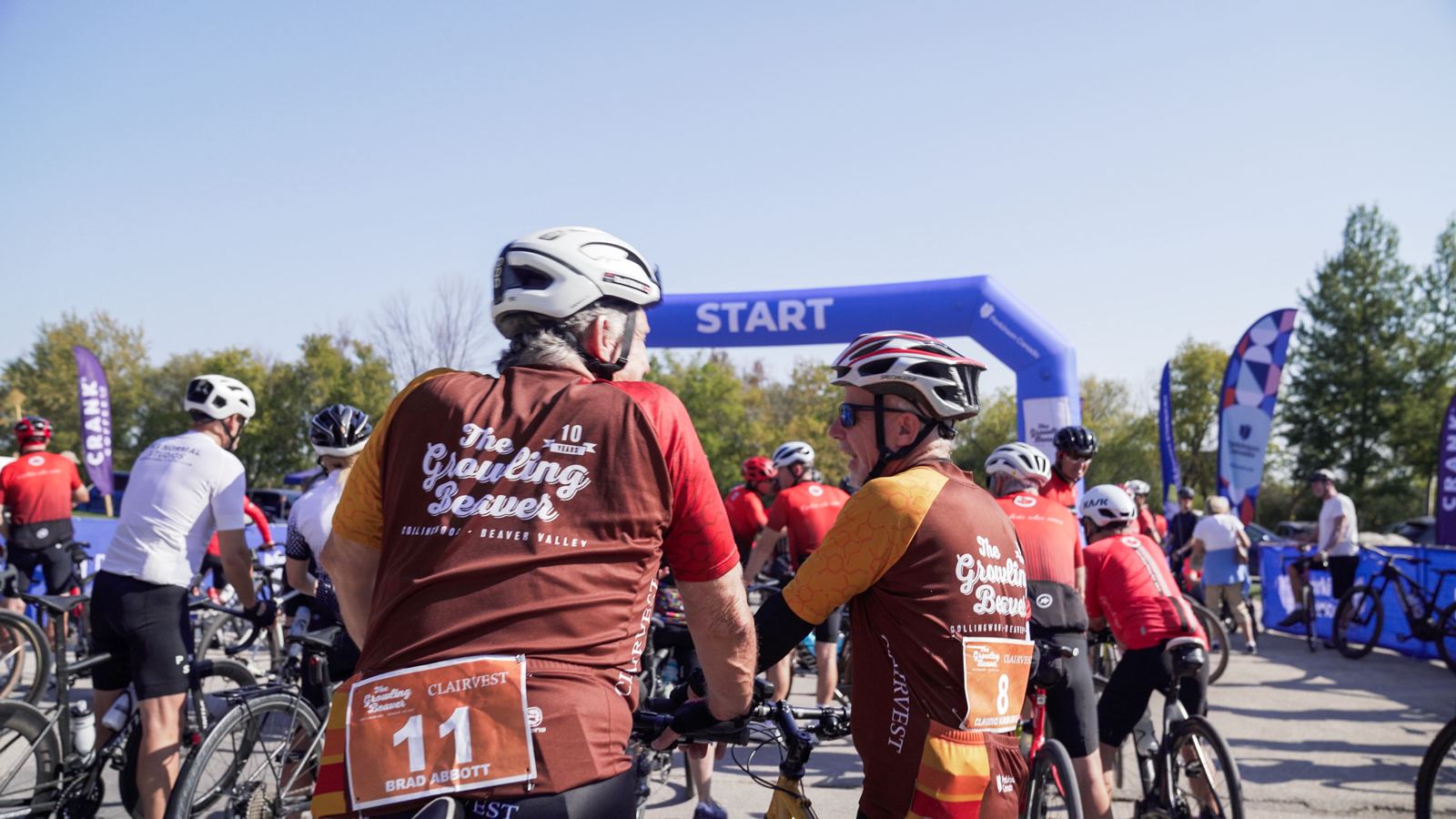 Two riders chatting at the start line
